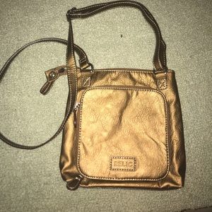 Relic cross body bronze purse